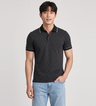 Polo de punto liso de algodón con logotipo negro